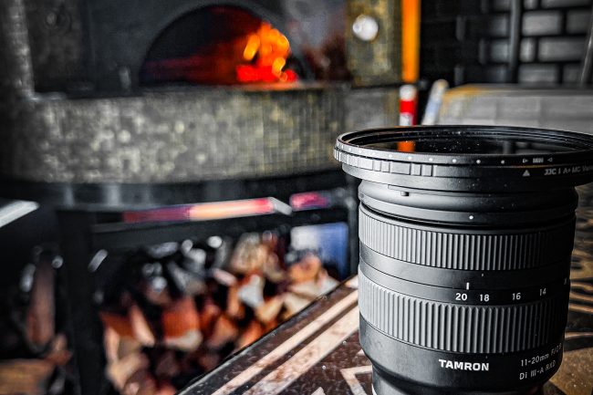 The Hood - Lens with Woodfire in background