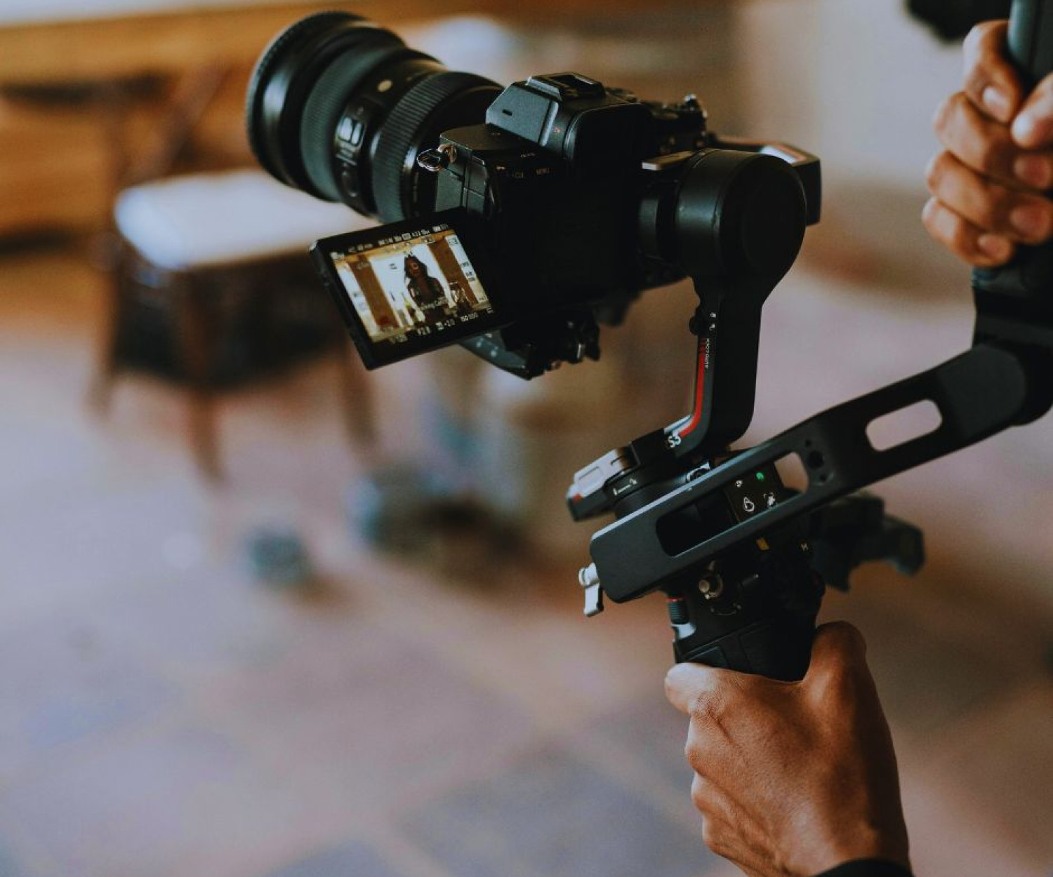 Videographer with a gimbal producing a social media reel